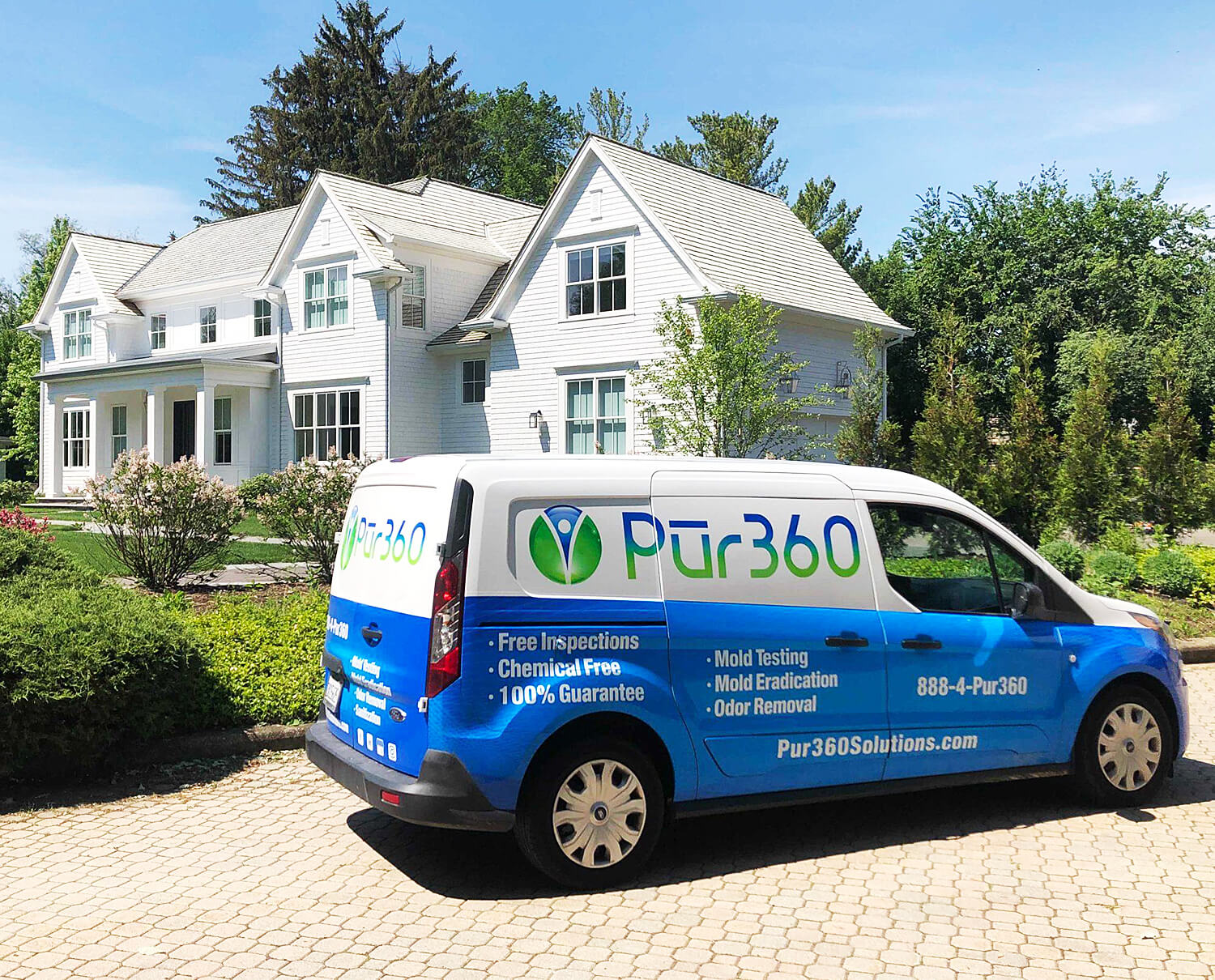 Pur360 service van parked on driveway outside a home