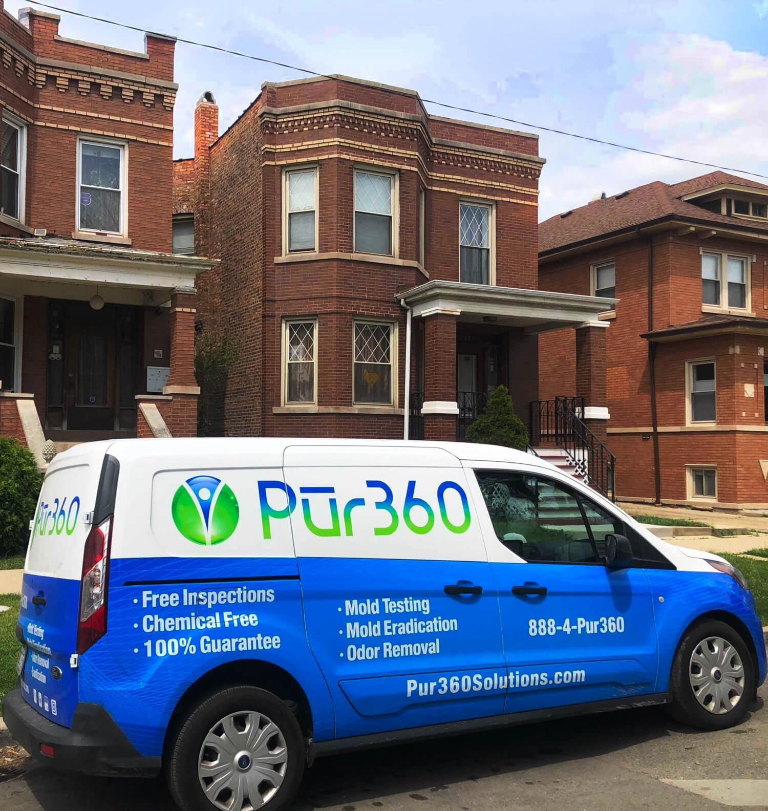 Pur360 van parked on the street outside a home